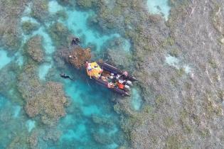 Removing marine debris from Papahānaumokuākea Marine National Monument | Credit: Steven Gnam, JIMAR/NOAA PIFSC