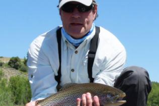 NFWF board chairman holding a fish